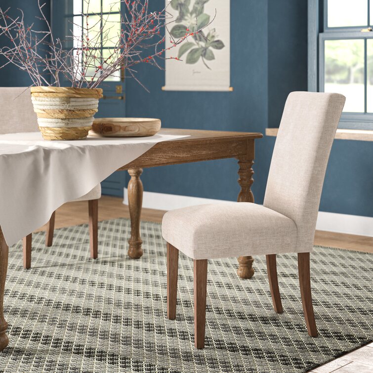 Upholstered dining 2025 chairs beige